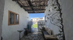 00Tarifarealestate-Bolonia-V-DEB-cozy house-entrance patio